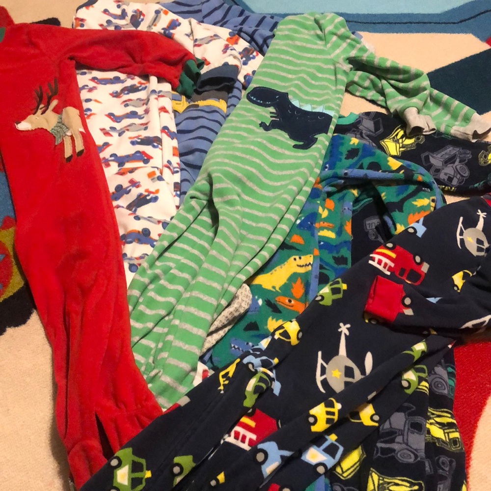 Big lot of footie pajamas